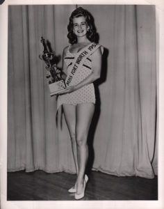 SYMONS, Thos. M. Miss Football of 1957.